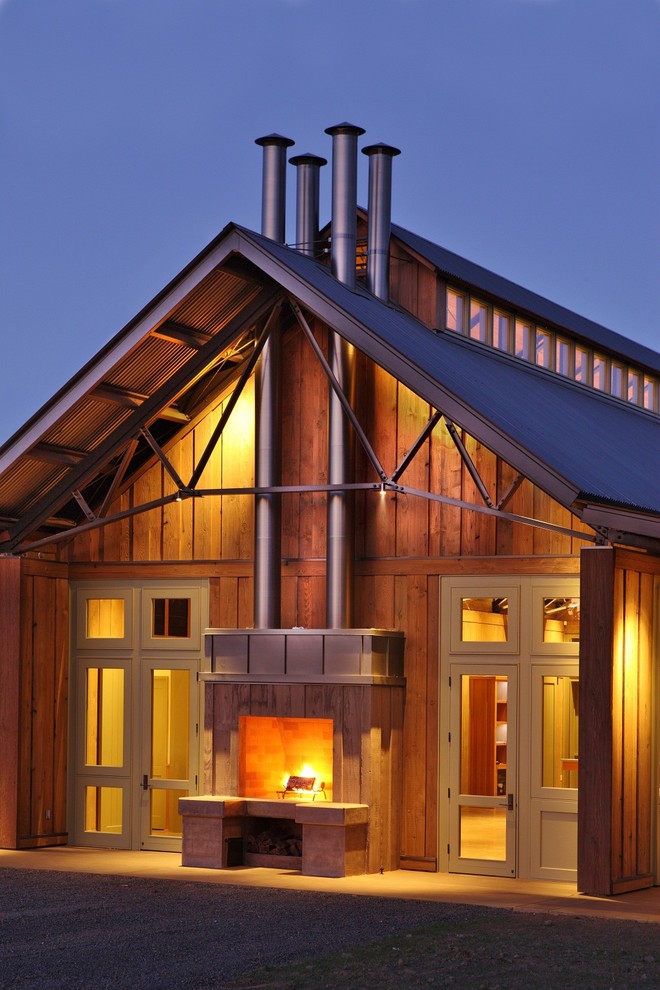 Country wood exterior home photo in Portland