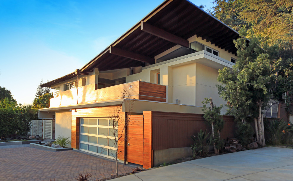 Design ideas for a medium sized and gey contemporary two floor house exterior in Los Angeles with wood cladding.