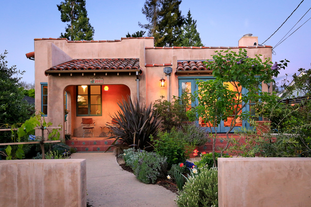 This is an example of a small bungalow clay house exterior in San Francisco.