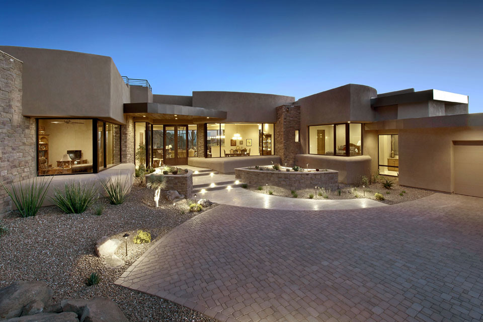 Inspiration for a beige bungalow render house exterior in Phoenix.