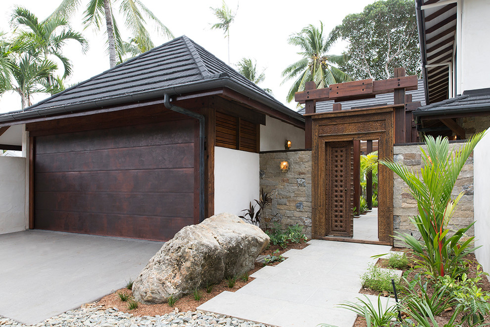 Example of an island style exterior home design in Cairns