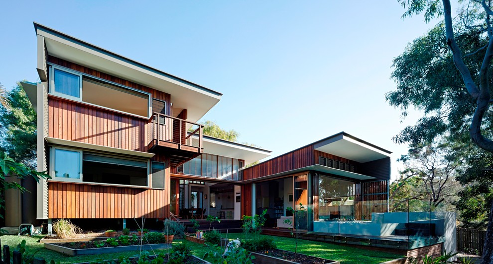 Design ideas for a contemporary house exterior in Sunshine Coast.