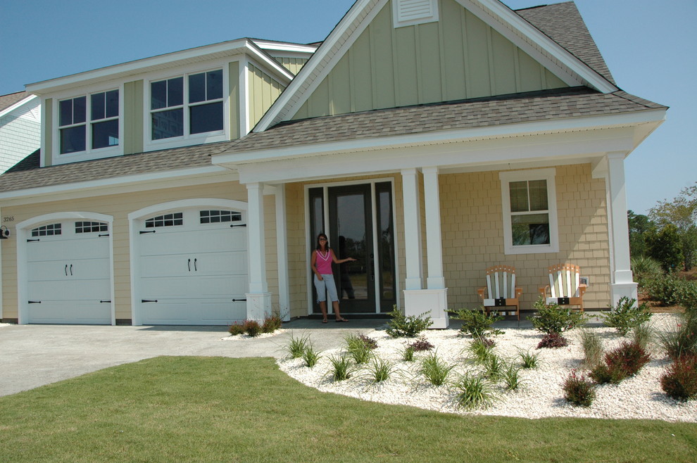 This is an example of a coastal house exterior in Other.