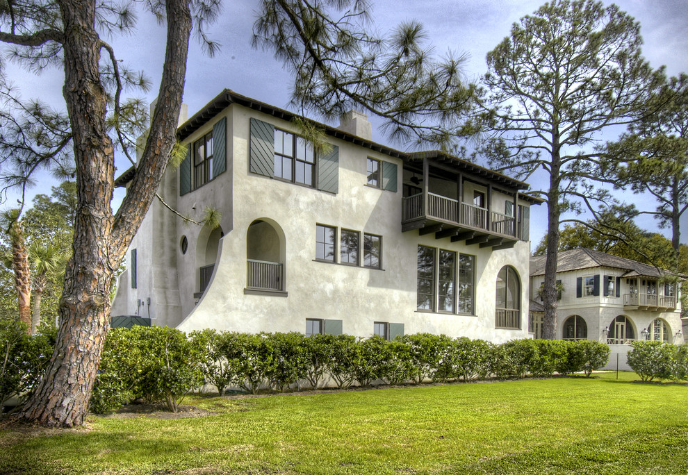 Mediterranean house exterior in Atlanta with three floors.