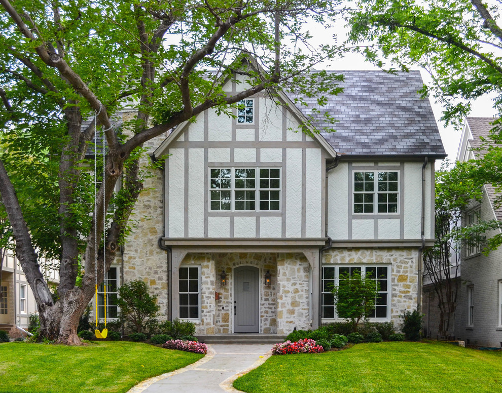 Photo of a classic two floor house exterior in Dallas with mixed cladding.