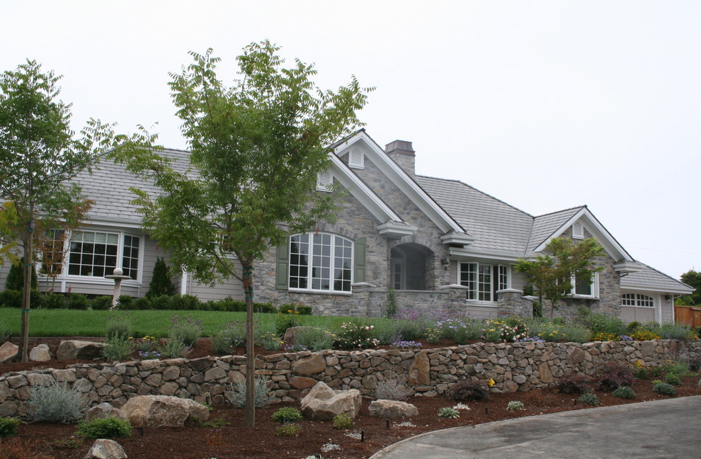Stone Exterior Remodel on SingleLevel Home Traditional Exterior