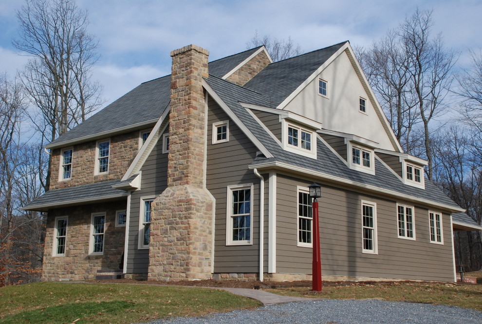 Modelo de fachada de estilo de casa de campo con revestimiento de piedra
