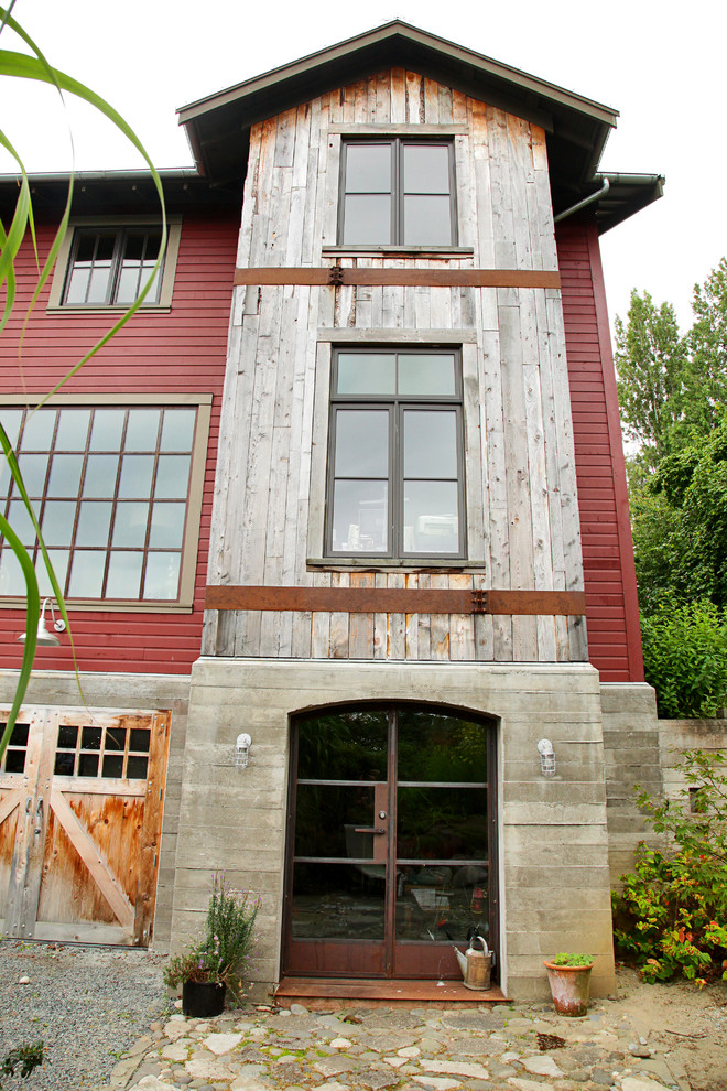 Inspiration for an eclectic three-story mixed siding exterior home remodel in Seattle