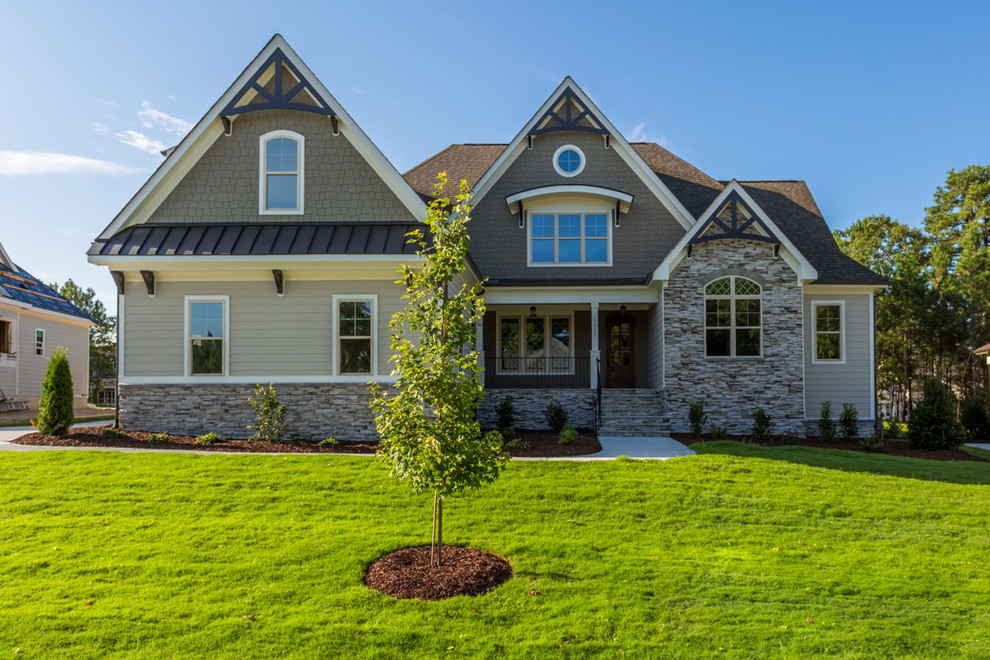 Example of an arts and crafts exterior home design in Raleigh