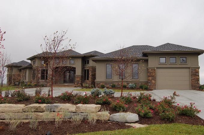 Tuscan exterior home photo in Omaha