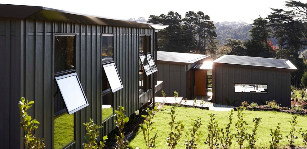 Ispirazione per la facciata di una casa piccola verde contemporanea a un piano