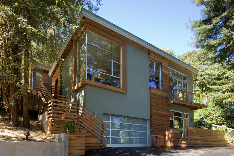 Large trendy green two-story mixed siding exterior home photo in San Francisco