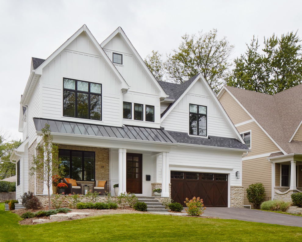 Mid-sized transitional white three-story concrete exterior home photo in Chicago