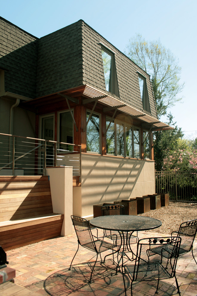 Inspiration for a contemporary two floor house exterior in Kansas City.