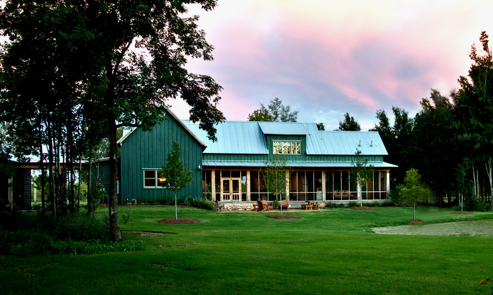Example of a country exterior home design in Jackson