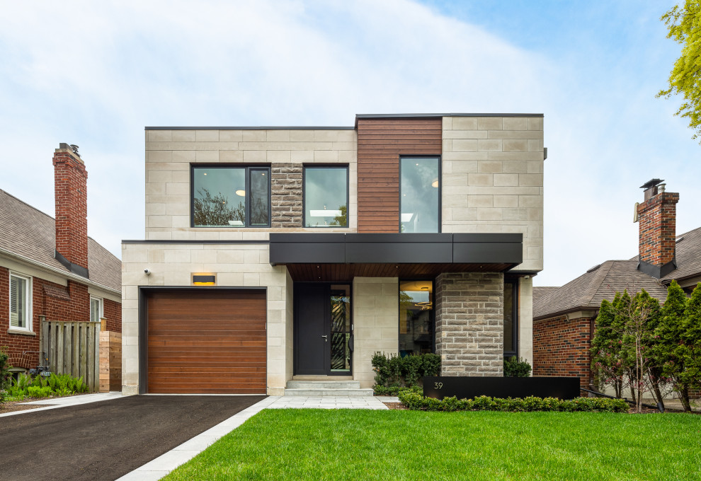Inspiration for a contemporary multicolored two-story mixed siding exterior home remodel in Toronto