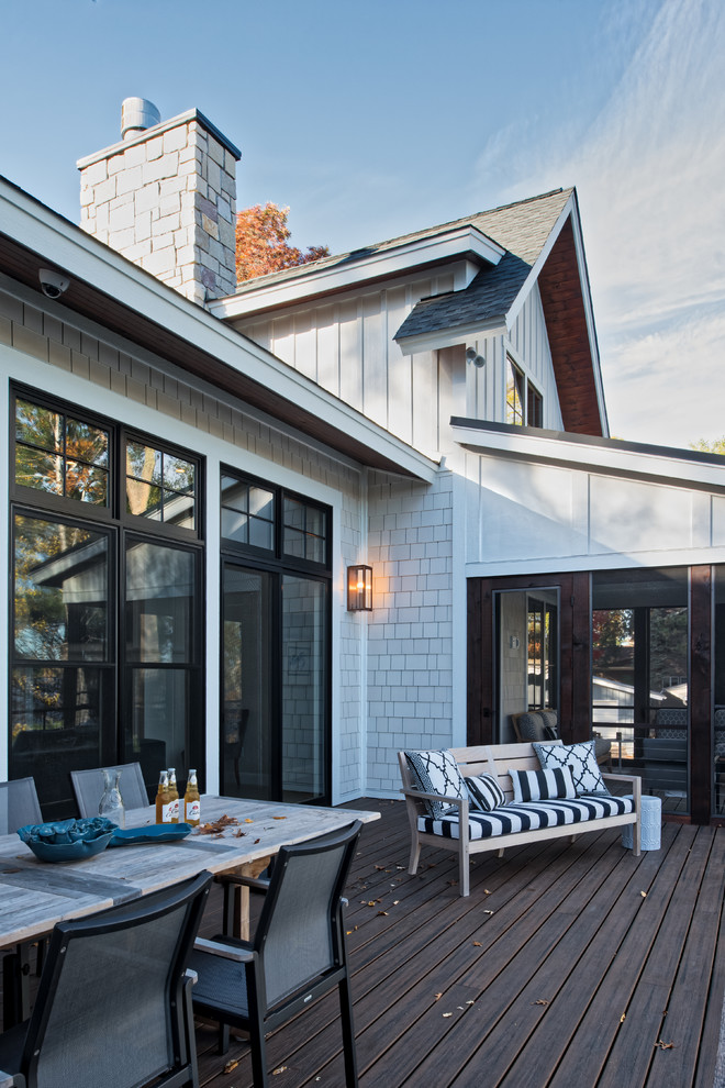 Design ideas for a white coastal detached house in Minneapolis.