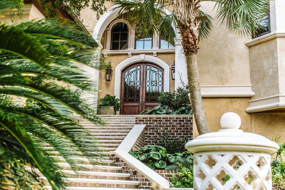 Inspiration for a large mediterranean entryway remodel in Charleston