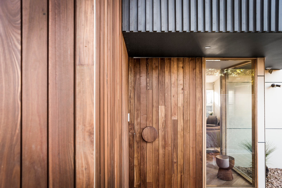 Example of a large minimalist exterior home design in Melbourne