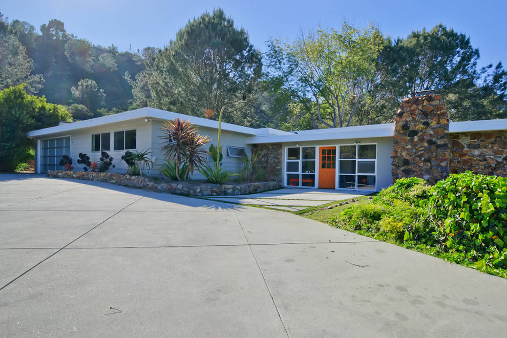 This is an example of a retro bungalow house exterior in San Diego.