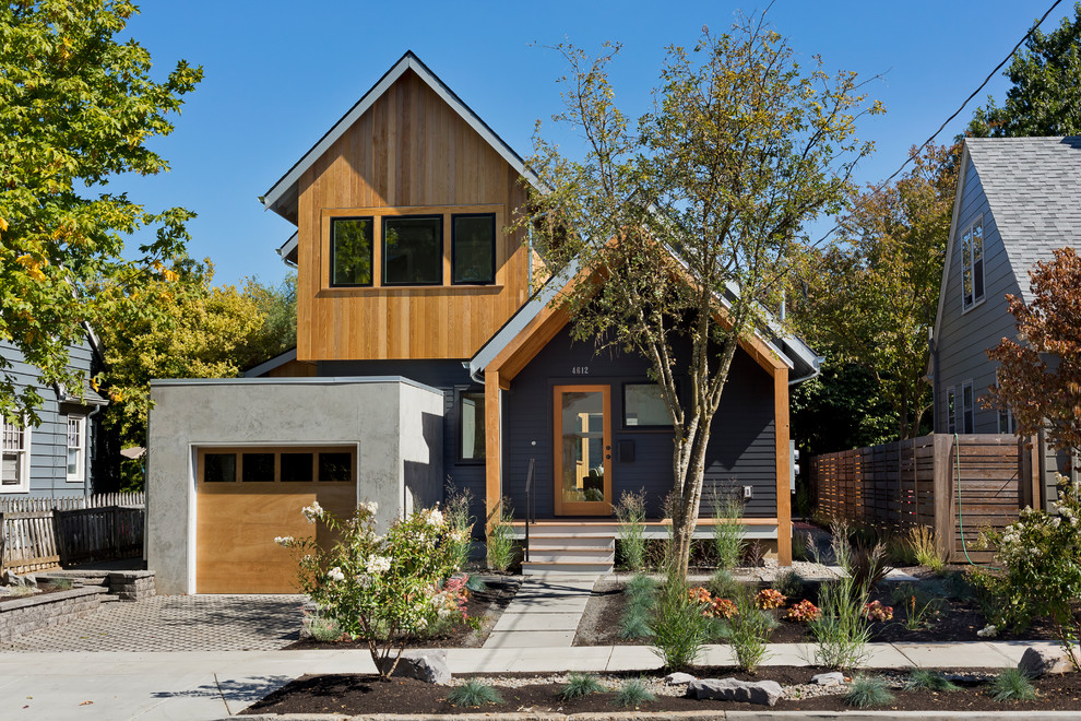 Farmhouse split-level mixed siding gable roof idea in Portland