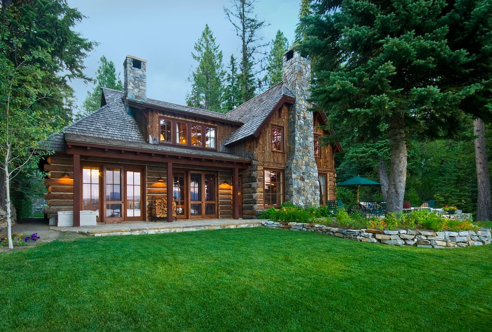 Photo of a brown rustic house exterior in Boise with wood cladding.