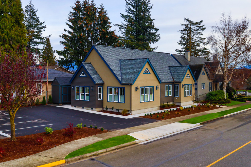Large traditional gray one-story mixed siding gable roof idea in Seattle