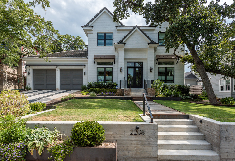 White classic two floor brick house exterior in Austin.