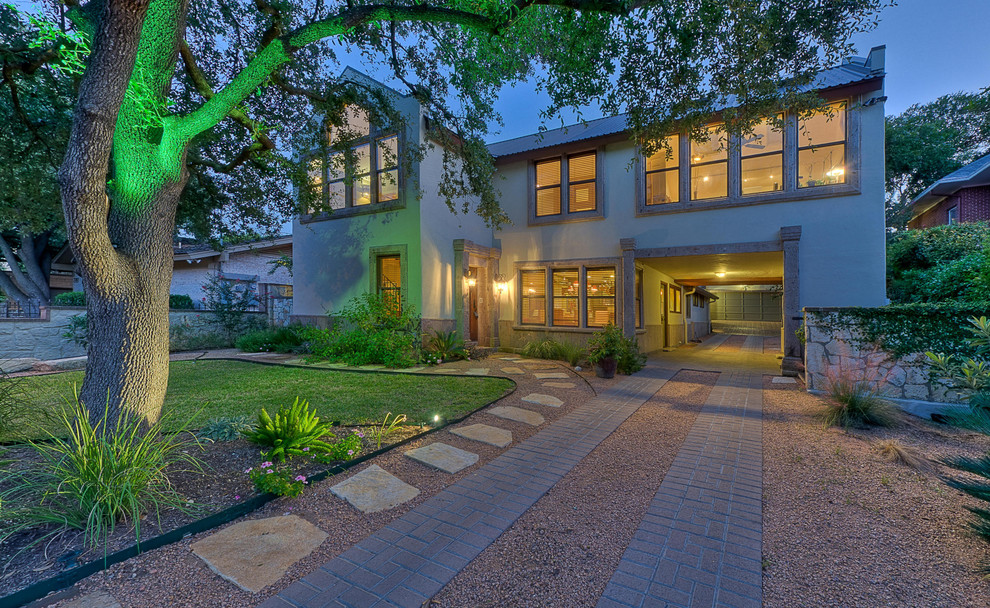 This is an example of a traditional two floor house exterior in Austin.