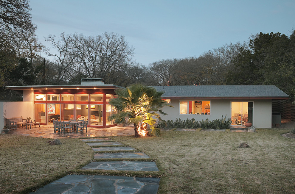Example of a 1960s exterior home design in Austin