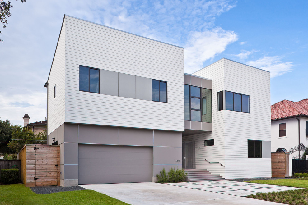 Contemporary white two-story mixed siding exterior home idea in Houston