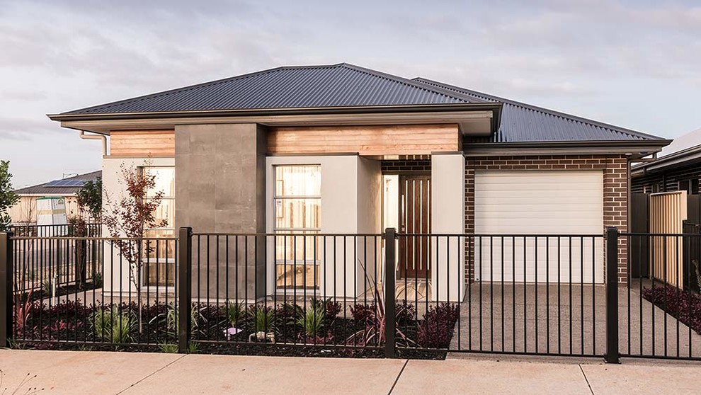 Inspiration for a transitional exterior home remodel in Adelaide