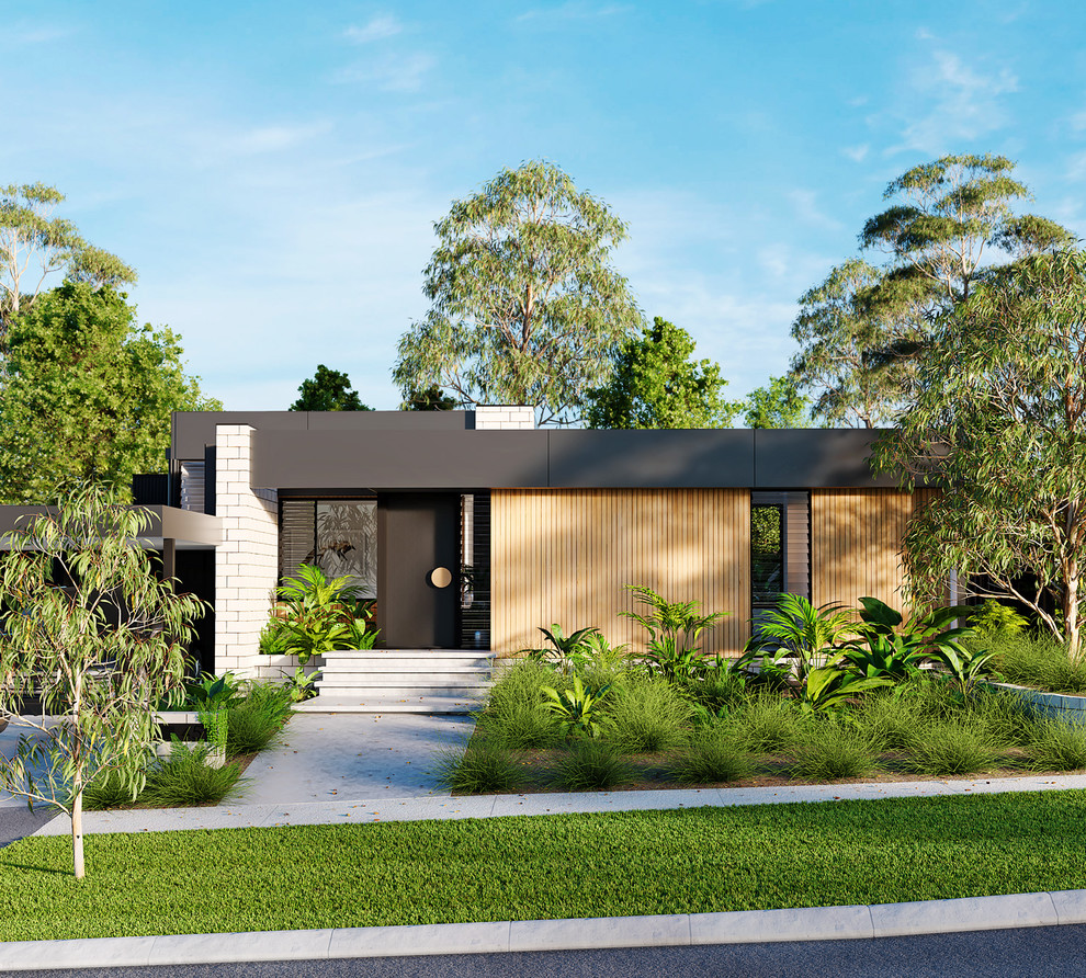 Réalisation d'une petite façade de maison multicolore design de plain-pied avec un toit plat, un toit en métal et un revêtement mixte.