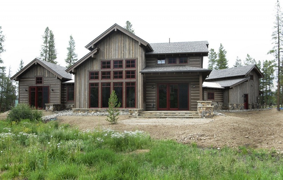 Large craftsman brown two-story wood exterior home idea in Denver with a shingle roof