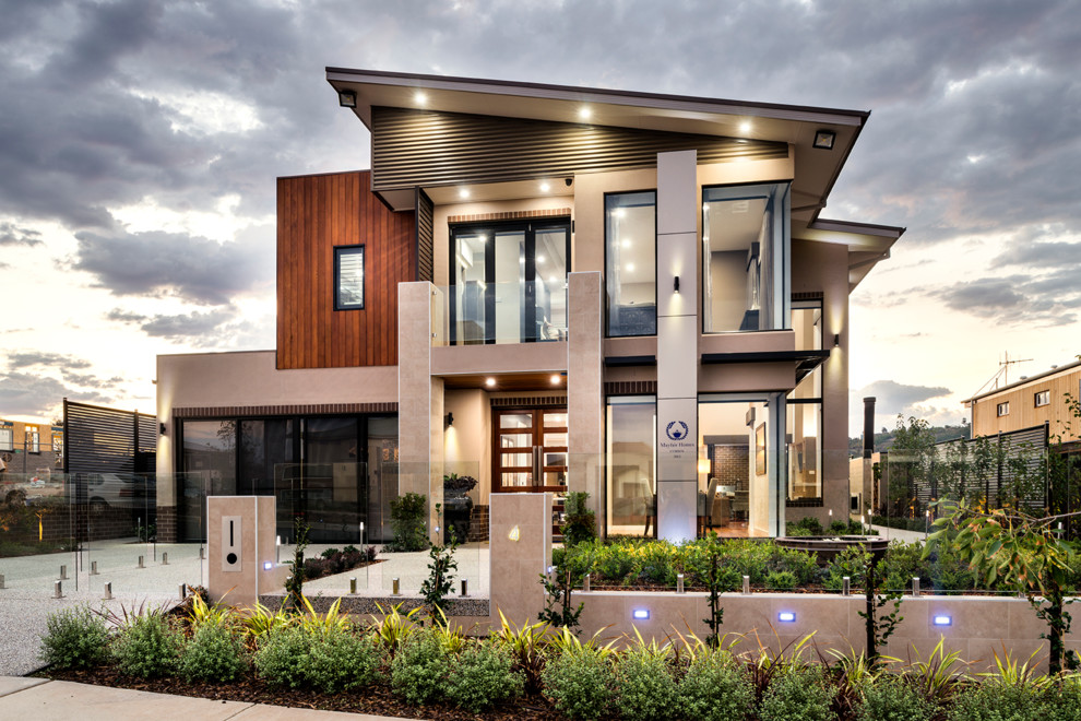 Inspiration for a large modern two-story exterior home remodel in Canberra - Queanbeyan