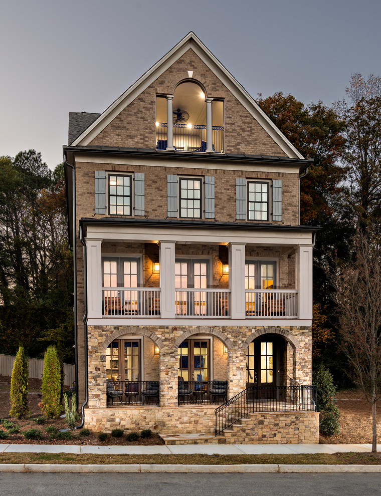 Photo of a large brick house exterior in Atlanta with three floors.