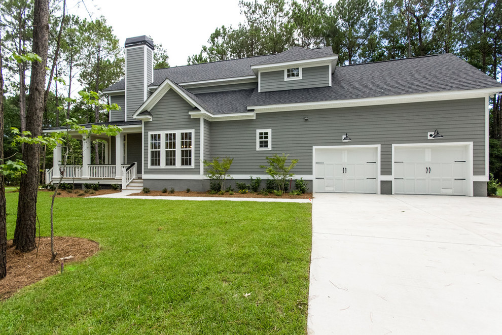 Mid-sized farmhouse gray two-story wood house exterior photo in Charleston