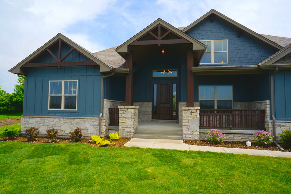 Example of a mountain style blue two-story concrete fiberboard exterior home design in Chicago