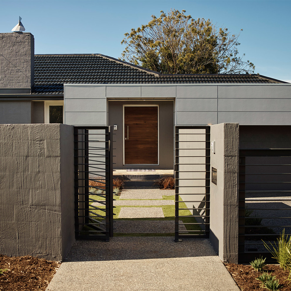 Mid-sized trendy gray one-story exterior home photo in Melbourne