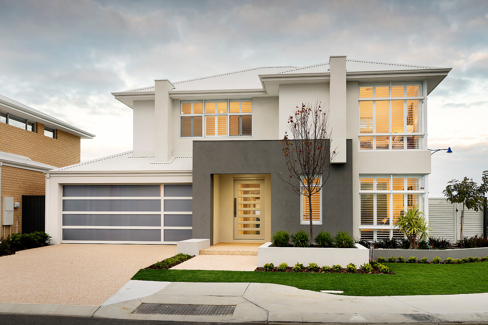 Large and beige contemporary two floor concrete house exterior in Perth with a hip roof.