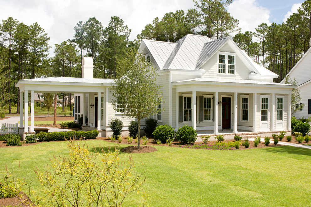 Example of a small classic two-story exterior home design in Charleston