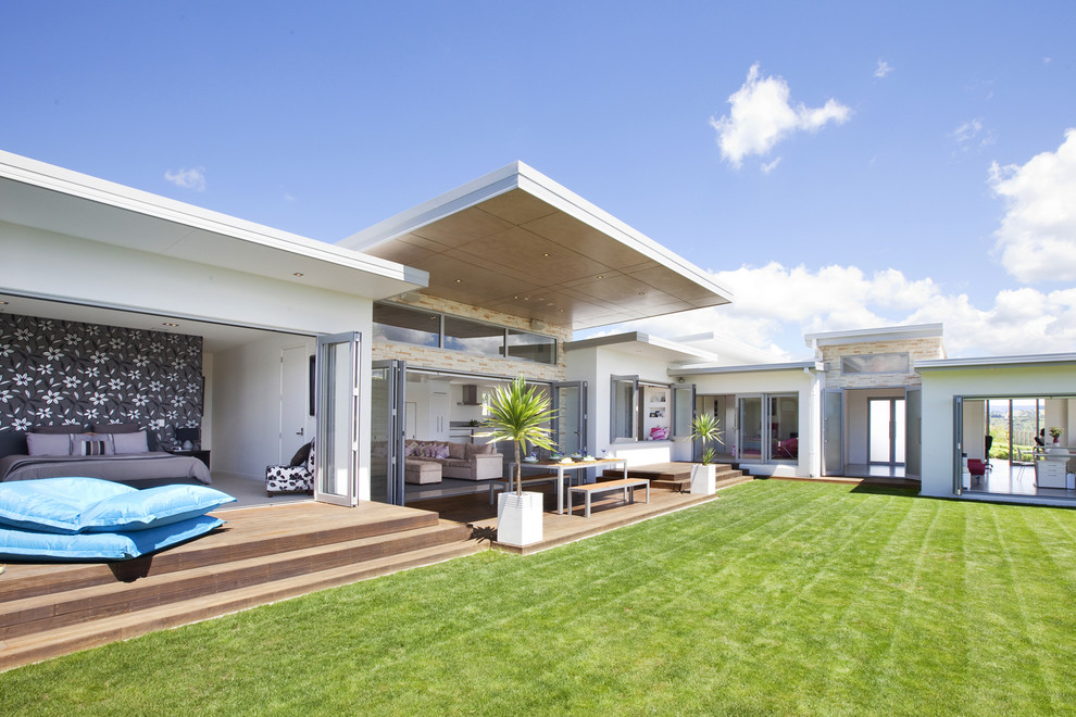 Inspiration for a modern one-story exterior home remodel in Other