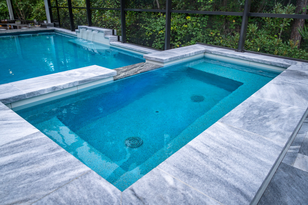 Inspiration for a large contemporary pool remodel in Jacksonville