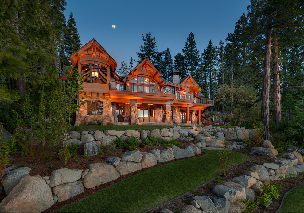 Example of a large mountain style two-story mixed siding exterior home design in Sacramento
