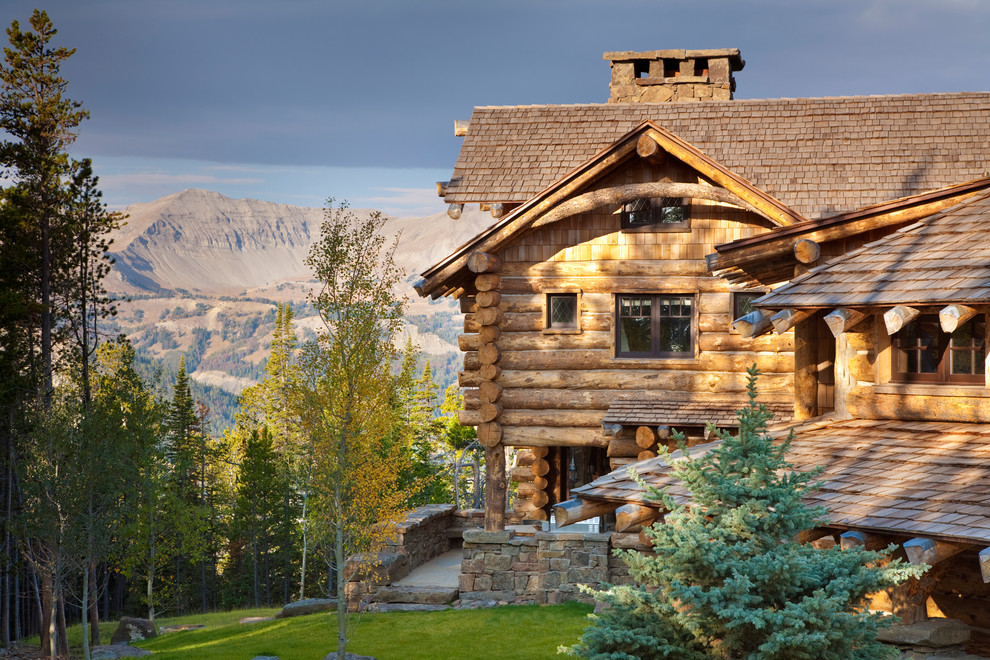 Example of a mountain style wood exterior home design in Other