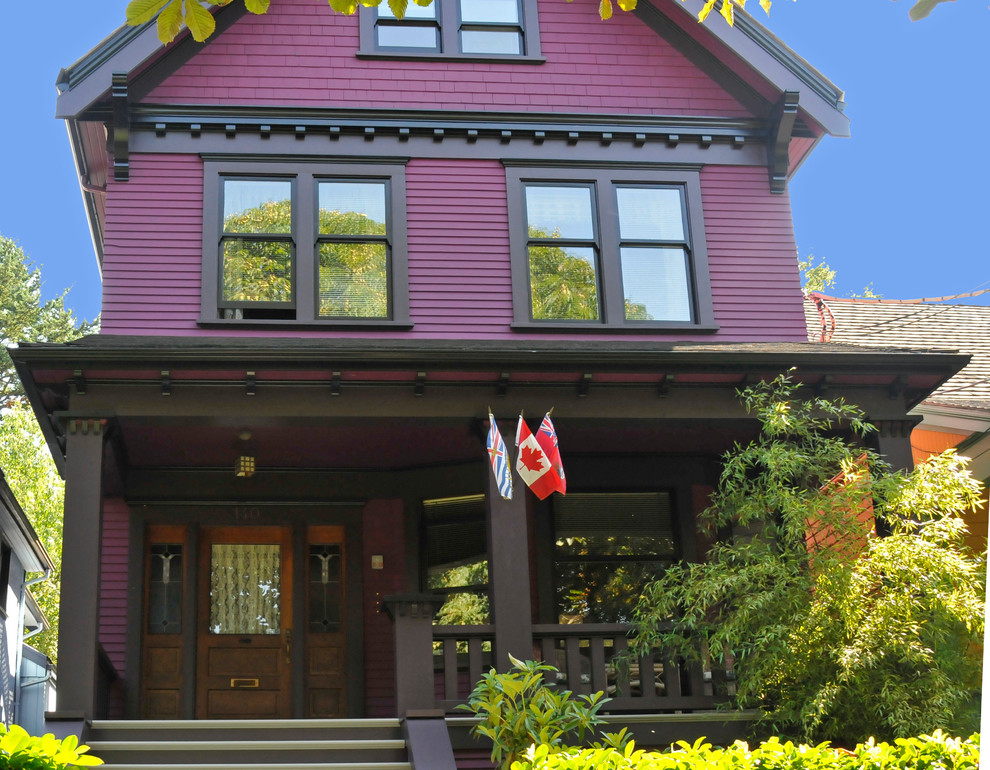 Inspiration for a medium sized victorian detached house in Vancouver with three floors, wood cladding, a pitched roof, a shingle roof and a purple house.