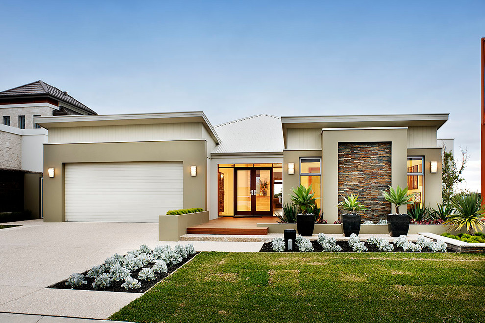 Example of a trendy beige one-story exterior home design in Perth with a mixed material roof