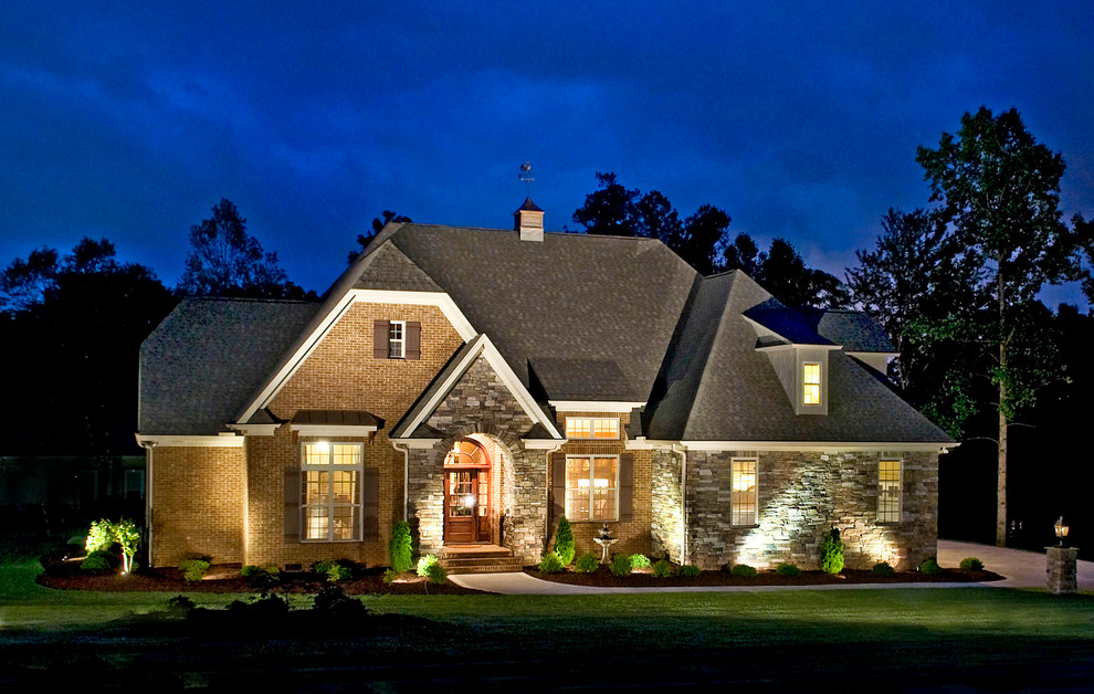 Inspiration for a timeless mixed siding exterior home remodel in Charlotte