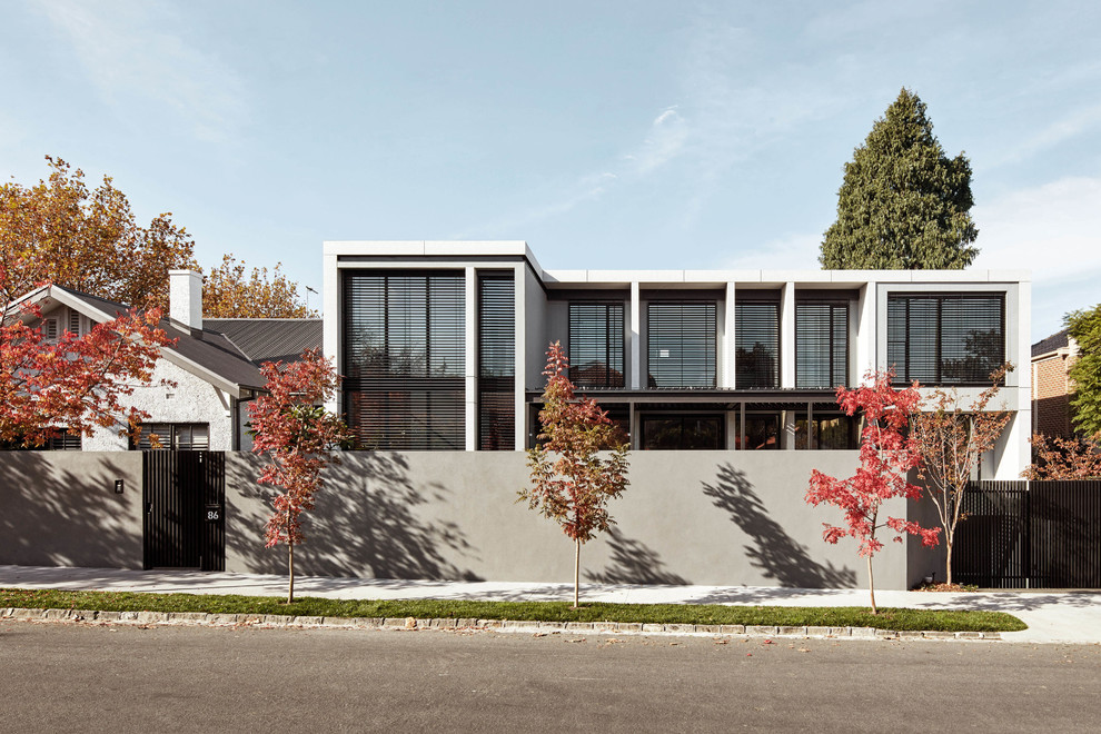 Foto de fachada de casa gris contemporánea extra grande de dos plantas con revestimiento de hormigón y tejado plano