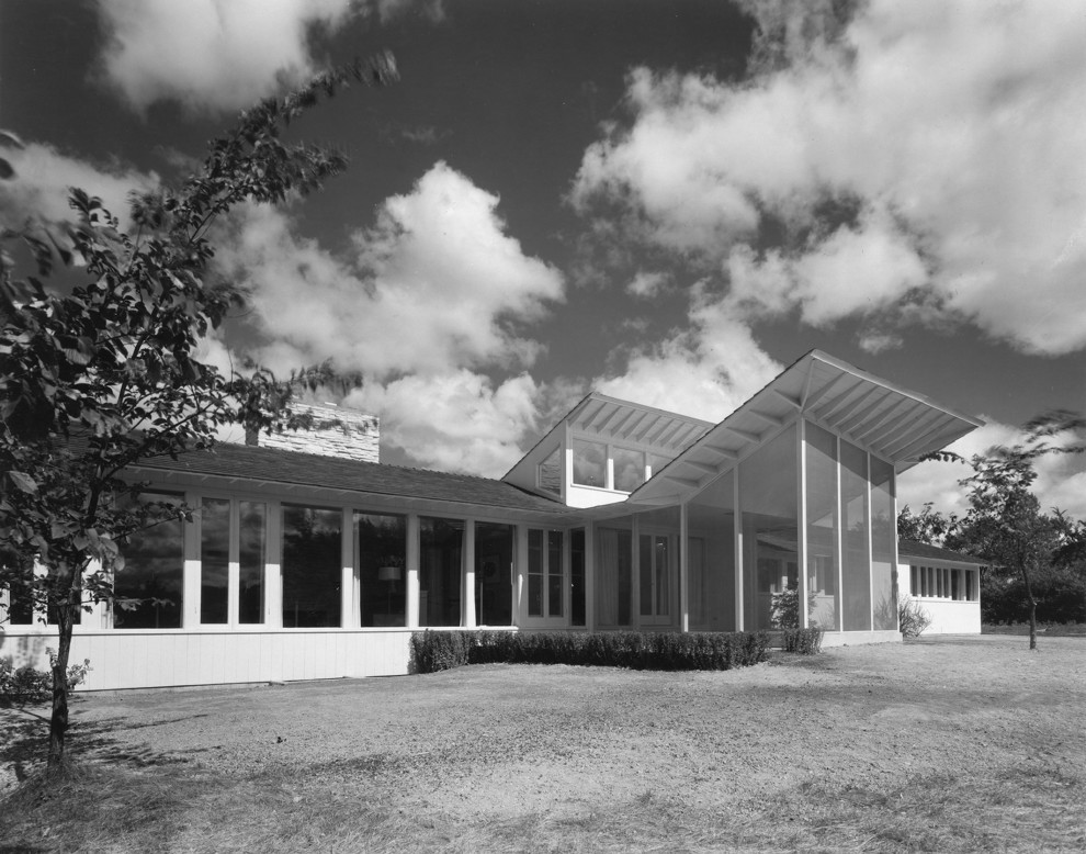 Example of a minimalist exterior home design in Other